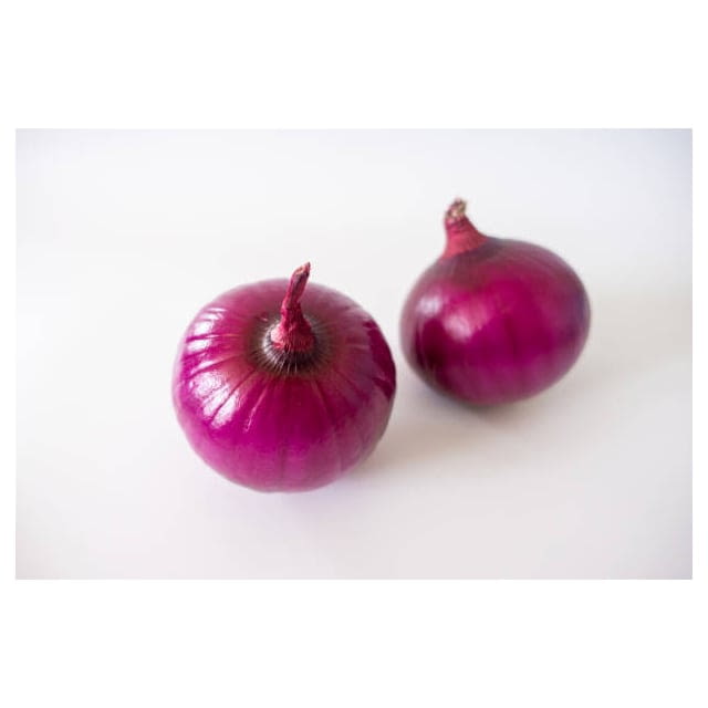 Peeled whole red onions