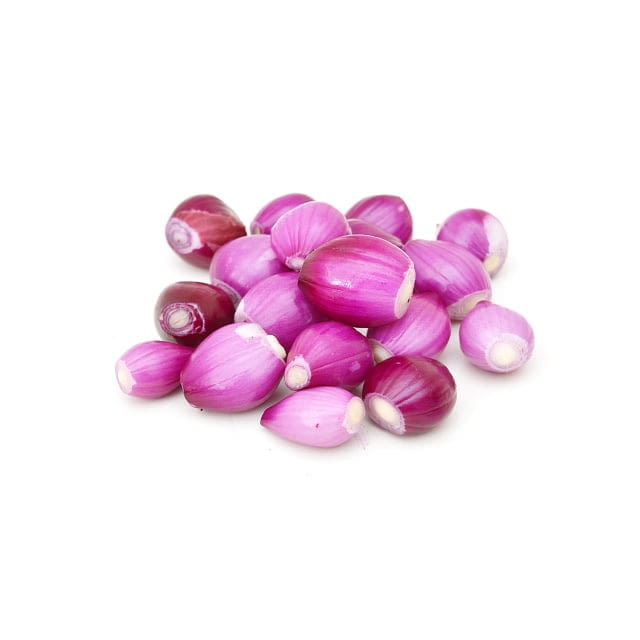 Peeled red pearl onion